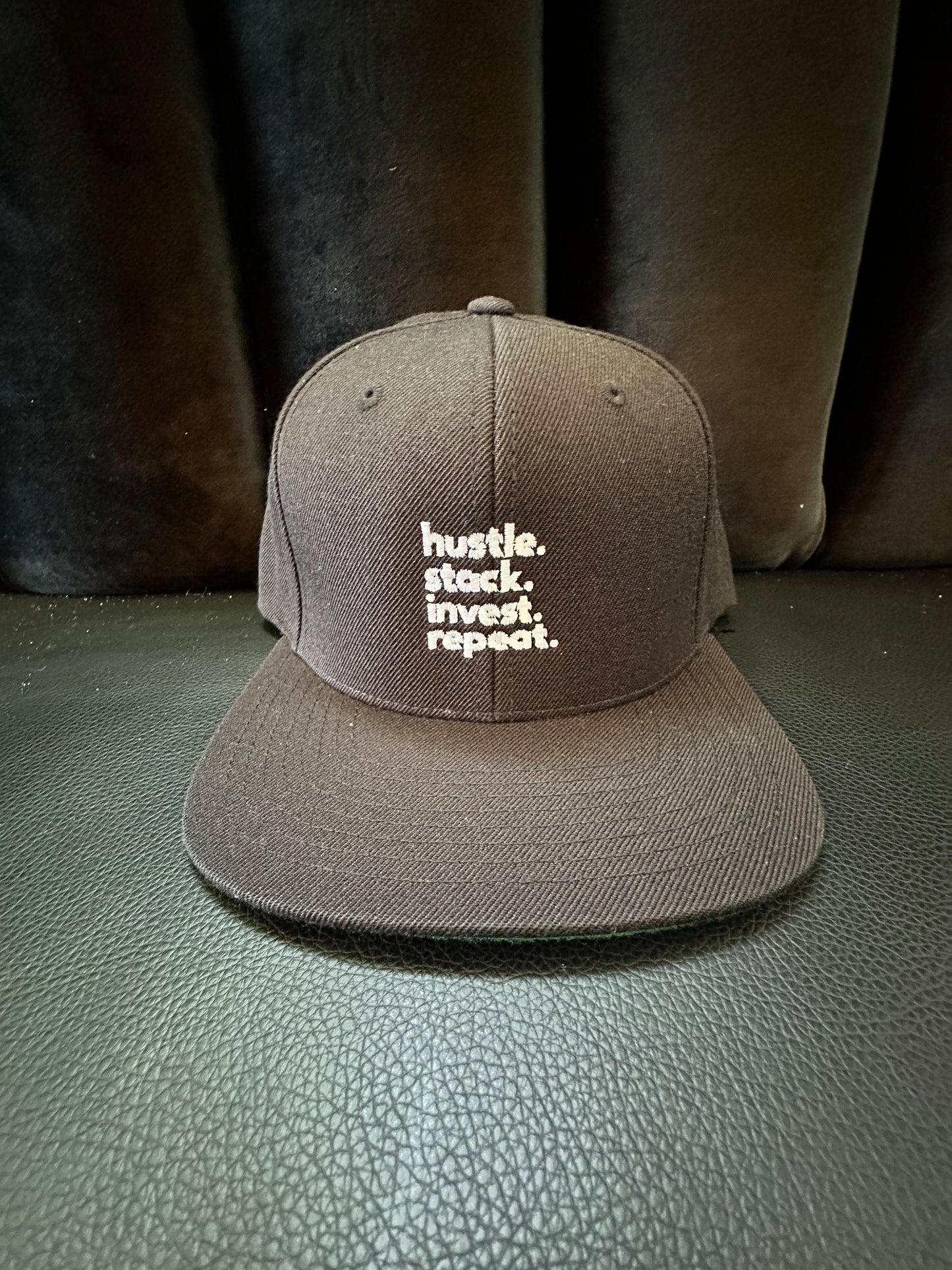 hustle. stack. invest. repeat. SnapBack Cap