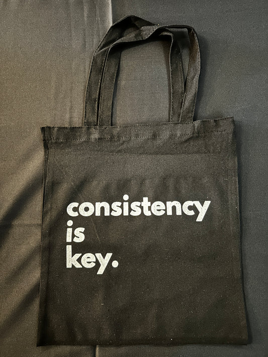 consistency is key. Tote Bag